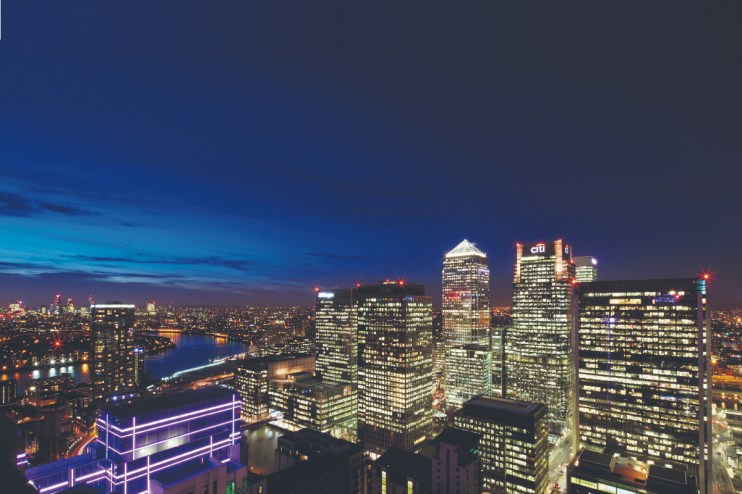 Canary Wharf skyline, highlighting the financial district, related to QFEX launch by Cambridge graduates in trading sector