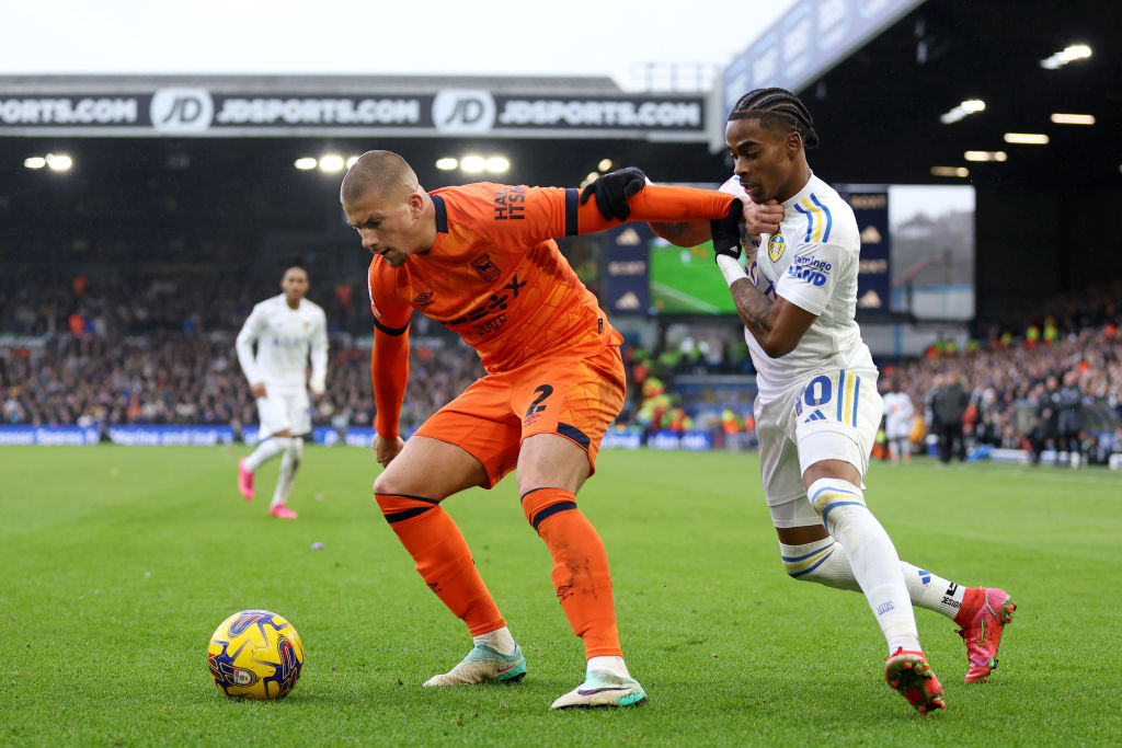 LEEDS, ENGLAND - DECEMBER 23: Harry Clarke of Ipswich Town is challenged by Crysencio Summerville of Leeds United during the Sky Bet Championship match between Leeds United and Ipswich Town at Elland Road on December 23, 2023 in Leeds, England. (Photo by George Wood/Getty Images)