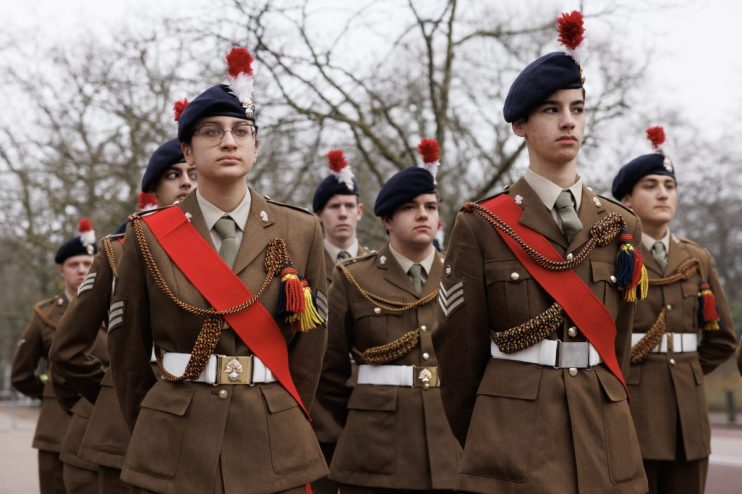 LONDON, ENGLAND - MARCH 11: Cadets line up as they attend a Commonwealth Day Ceremony at Memorial Gate on March 11, 2024 in London, England. Government representatives and organisations from across the Commonwealth attended a ceremony preceding the annual Commonwealth Day service. They laid wreaths to honour the five million men and women from Africa, the Caribbean, and the Indian subcontinent who volunteered to serve with the Armed Forces during the First and Second World Wars. (Photo by Dan Kitwood/Getty Images)