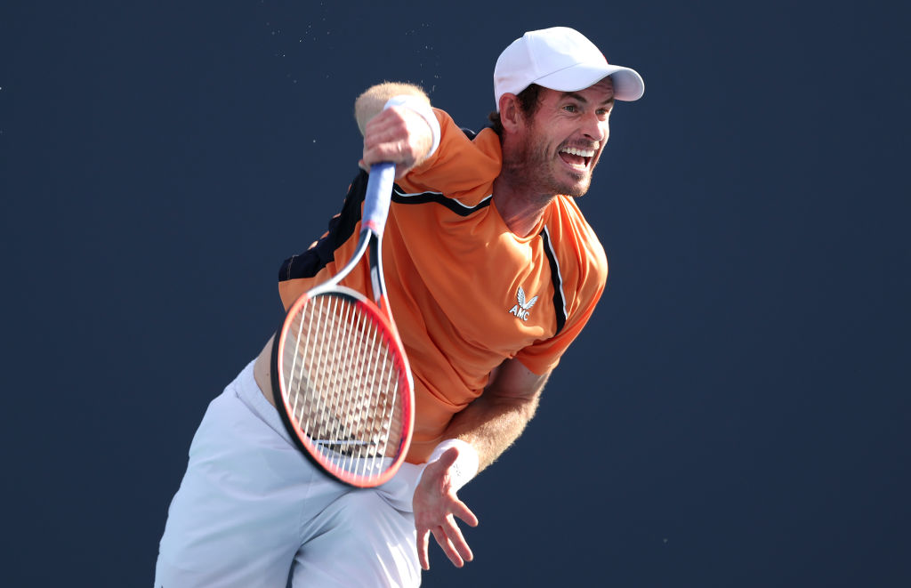 MIAMI GARDENS, FLORIDA - MARCH 24:  Andy Murray of Great Britain serves against Tomas Machac of the Czech Republic on Day 9 of the Miami Open at Hard Rock Stadium on March 24, 2024 in Miami Gardens, Florida. (Photo by Al Bello/Getty Images)