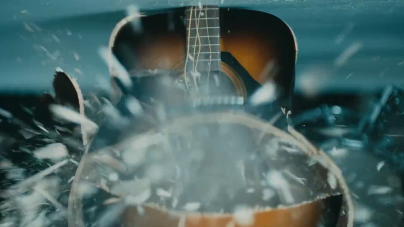 Guitar is crushed during Apple's controversial ad for its new ipad.