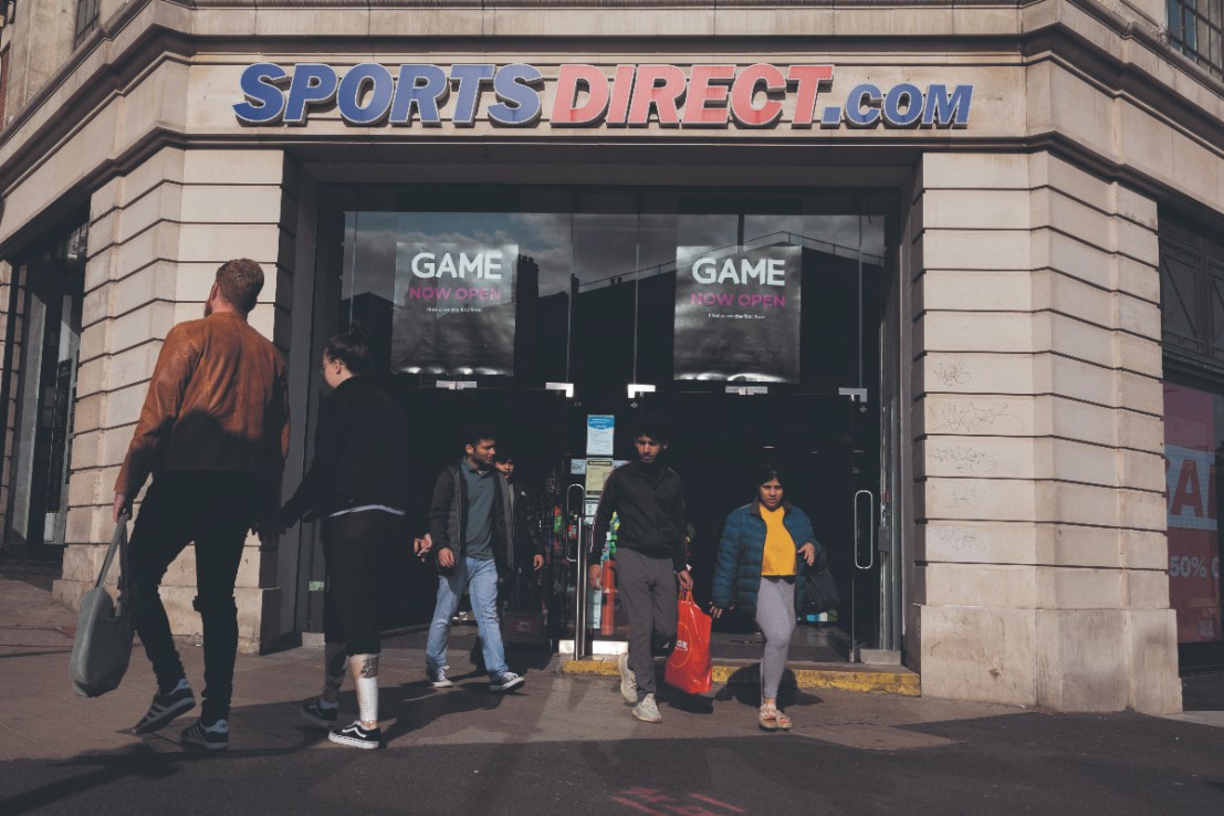 Groups of shoppers leave a branch of British high street sports goods and fashion retailer Sports Direct on 2nd September, 2021 in Leeds, United Kingdom. (photo by Daniel Harvey Gonzalez/In Pictures via Getty Images)