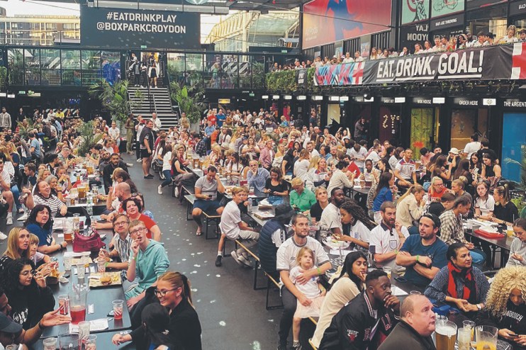Euro 2022 finals led to a bit bump for retail. Here hundreds of England fans watch in a Boxpark
