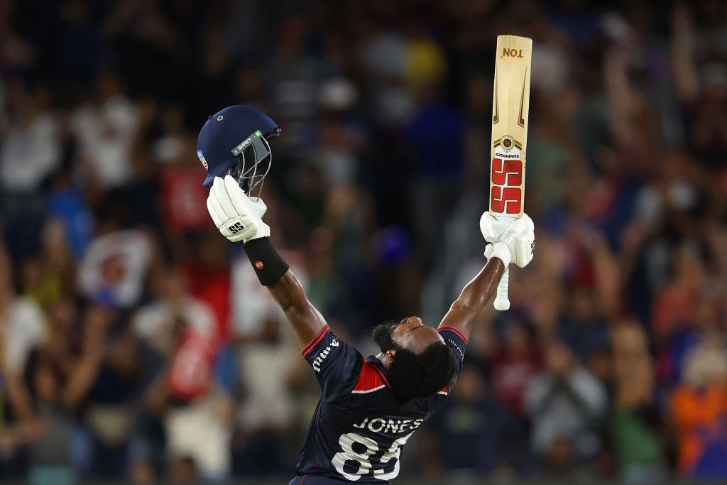DALLAS, TEXAS - JUNE 01: Aaron Jones of USA celebrates winning the ICC Men's T20 Cricket World Cup West Indies & USA 2024 match between USA  and Canada at  Grand Prairie Cricket Stadium on June 01, 2024 in Dallas, Texas. (Photo by Robert Cianflone/Getty Images)