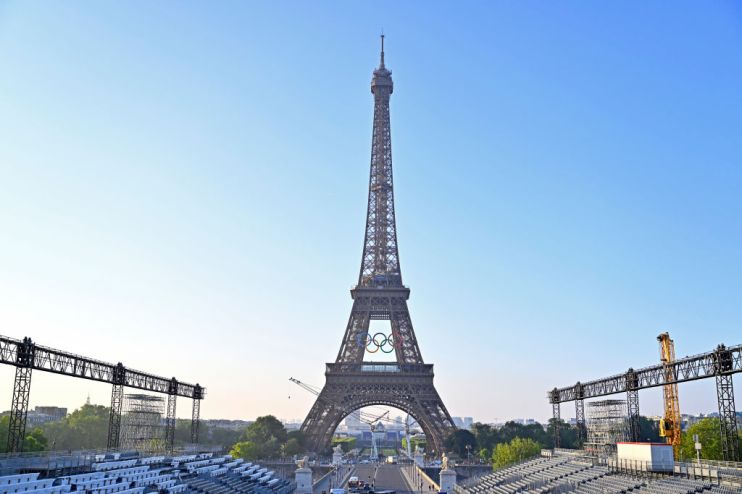 The Olympic Rings are displayed on the Eiffel Tower - 50 days before the opening of the Olympic Games