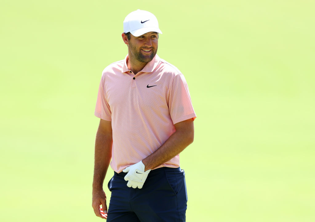 PINEHURST, NORTH CAROLINA - JUNE 10: Scottie Scheffler of the United States smiles on the fourth hole during a practice round prior to the U.S. Open at Pinehurst Resort on June 10, 2024 in Pinehurst, North Carolina. (Photo by Andrew Redington/Getty Images)