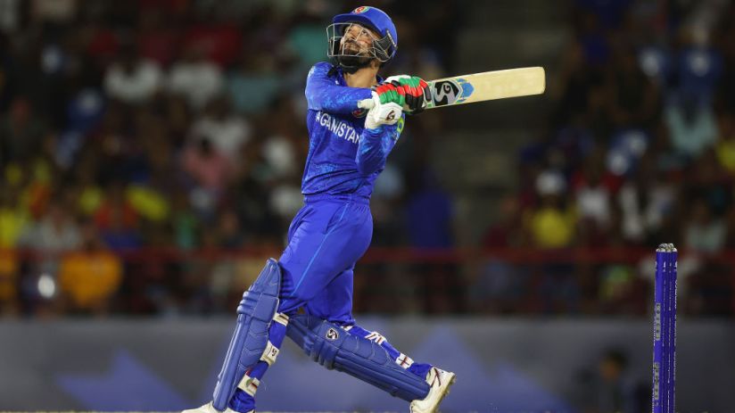 Rashid Khan hit three late sixes as Afghanistan reached the T20 World Cup semi-finals