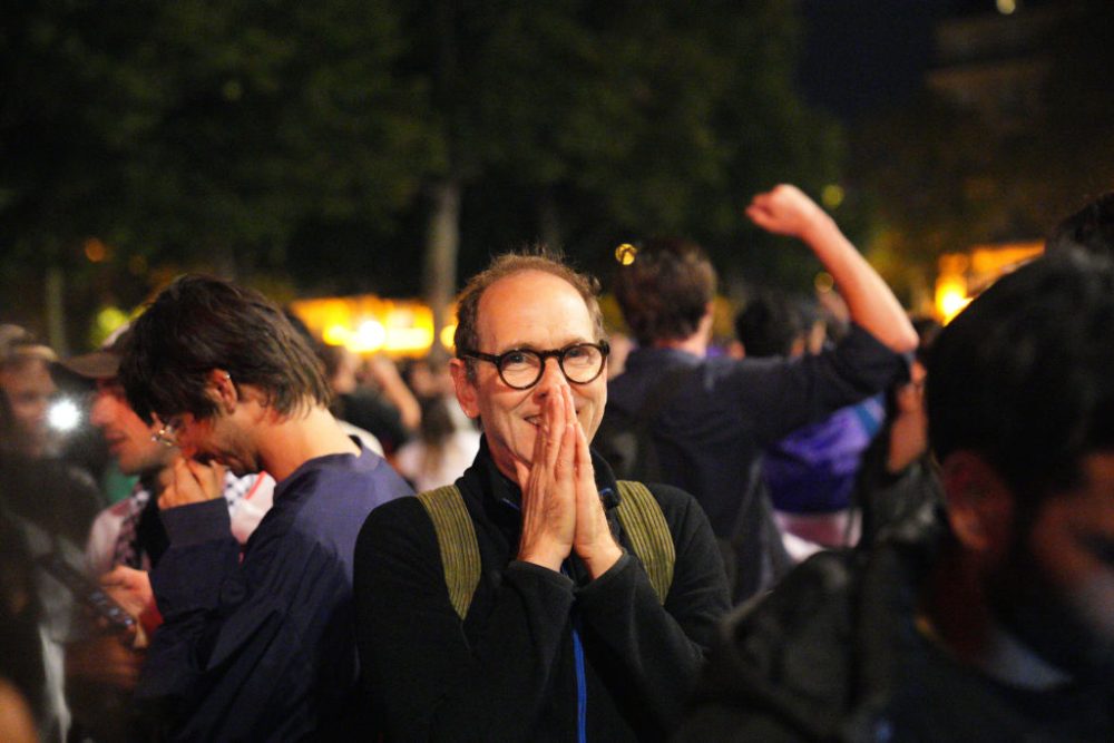 PARIS, FRANCE - JULY 7: People celebrate in Place de la Republique following the legislative election results on July 7, 2024 in Paris, France. 