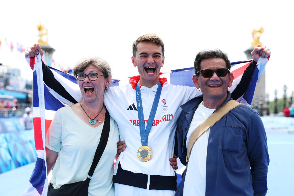 Alex Yee, with parents Emma and Ronald, won Olympic triathlon gold in Paris with a late surge
