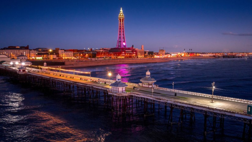 An aerial view of Blackpool Tower, North Pier and the promenade at night. (Photo by Christopher Furlong/Getty Images)