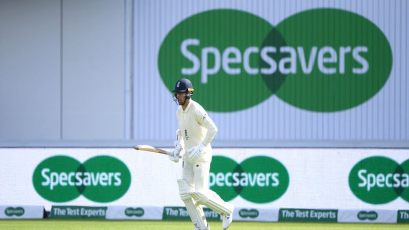 England batsman Jack Leach comes out to bat infront of the Specsavers advert during day four of the 4th Ashes Test Match between England and Australia at Old Trafford on September 07, 2019 in Manchester, England. (Photo by Stu Forster/Getty Images)