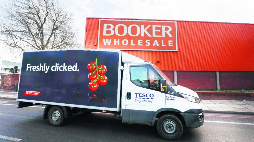 Retail giant Tesco has hiked its profit outlook for the year