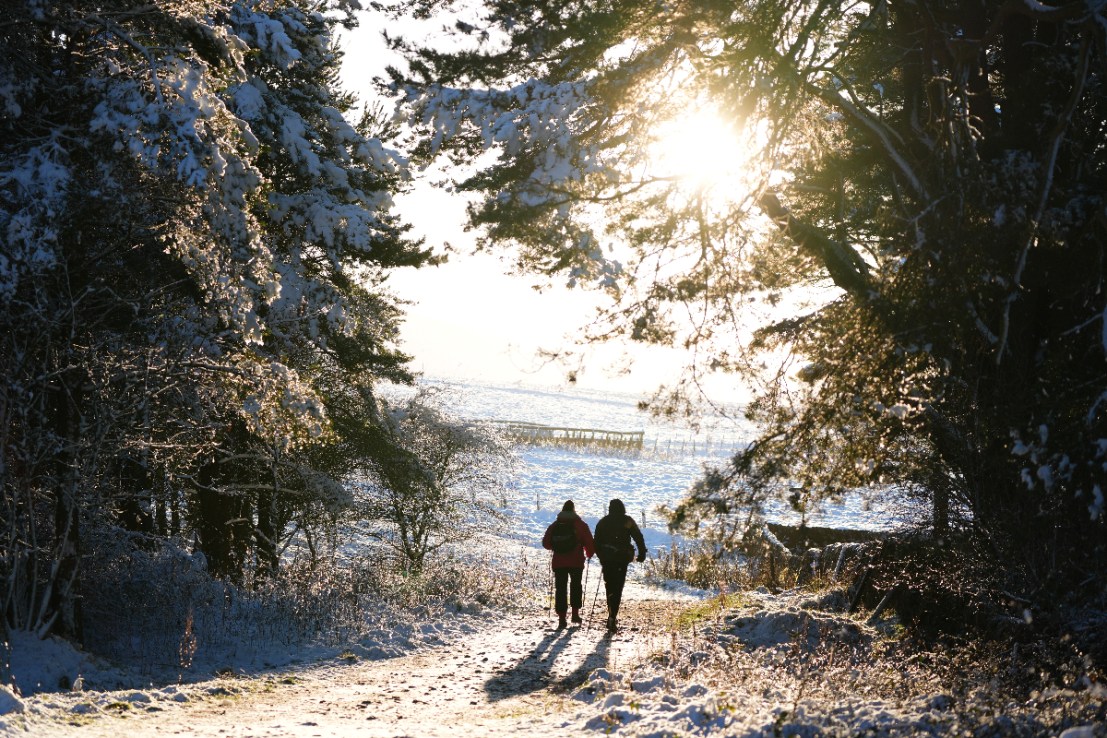 Large parts of the UK will be hit by heavy snow and freezing rain which could lead to disruption this weekend amid two amber weather warnings.