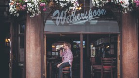 Wetherspoons pub interior, highlighting budget atmosphere amid minimum wage debate by founder Sir Tim Martin