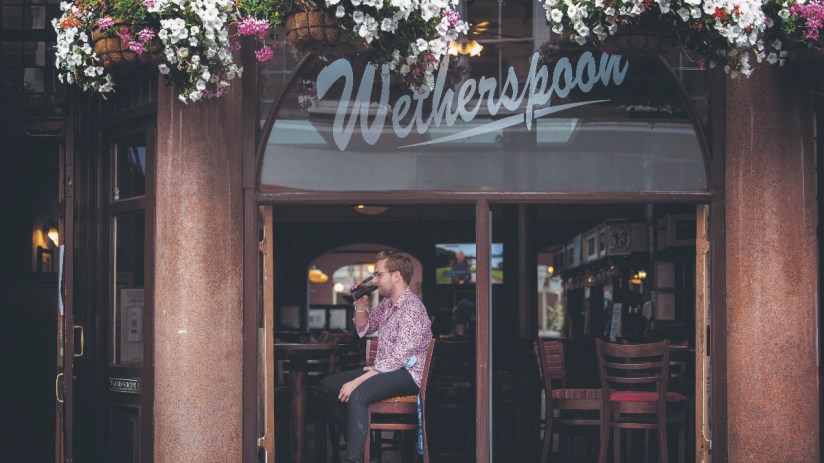 Wetherspoons pub interior, highlighting budget atmosphere amid minimum wage debate by founder Sir Tim Martin
