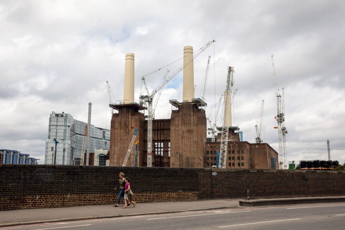 LONDON, ENGLAND - JULY 21: Cranes tower over the Battersea Power Station development July 21, 2017 in London, England. Over the last decade the landscape of South London has changed through a process of gentrification. As property and rental prices increase, local residents and businesses have moved out of areas of South London making way for new developments catering to the new higher-income residents. (Photo by Jack Taylor/Getty Images)
