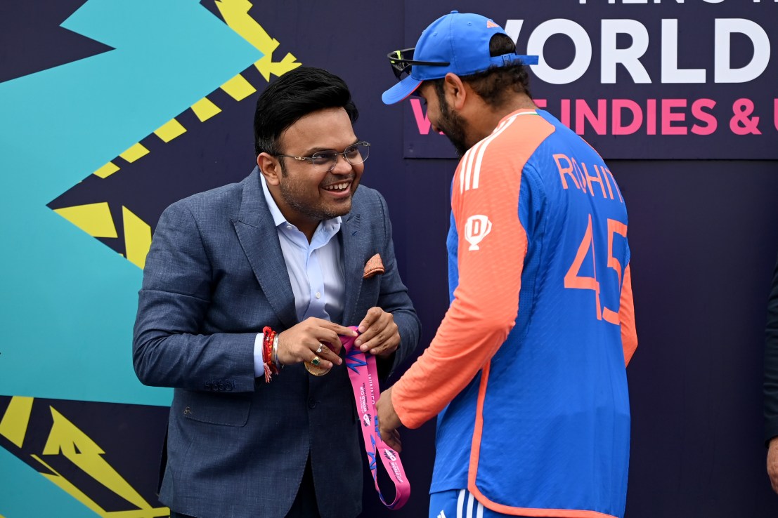BRIDGETOWN, BARBADOS - JUNE 29: BCCI Secretary Jay Shah presents India captain Rohit Sharma with his medal the ICC Men's T20 Cricket World Cup West Indies & USA 2024 Final match between South Africa and India at Kensington Oval on June 29, 2024 in Bridgetown, Barbados. (Photo by Gareth Copley/Getty Images)