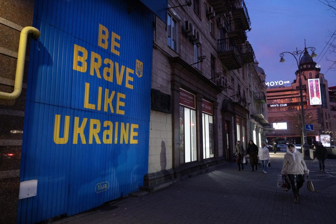 KYIV, UKRAINE - MARCH 05: Pedestrians walk past a sign supporting Ukraine in a downtown shopping area on March 5, 2025 in Kyiv, Ukraine. (Photo by Paula Bronstein / Getty Images)
