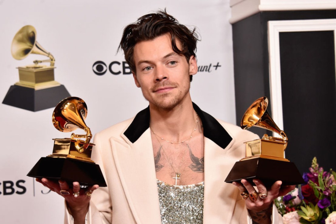 Harry Styles poses with the Best Pop Vocal Album Award and Album of the Year Award for Harry’s House during the 65th Grammy Awards in February 2023. (Photo by Alberto E. Rodriguez/Getty Images for The Recording Academy)
