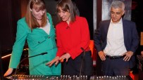 Deputy Prime Minister Angela Rayner (L), Chancellor of the Exchequer Rachel Reeves and Mayor of London Sir Sadiq Khan look at a sound engineer's mixing desk.