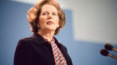 Margaret Thatcher smiling outside 10 Downing Street during her tenure as UKs longest-serving Prime Minister in the 20th ce...