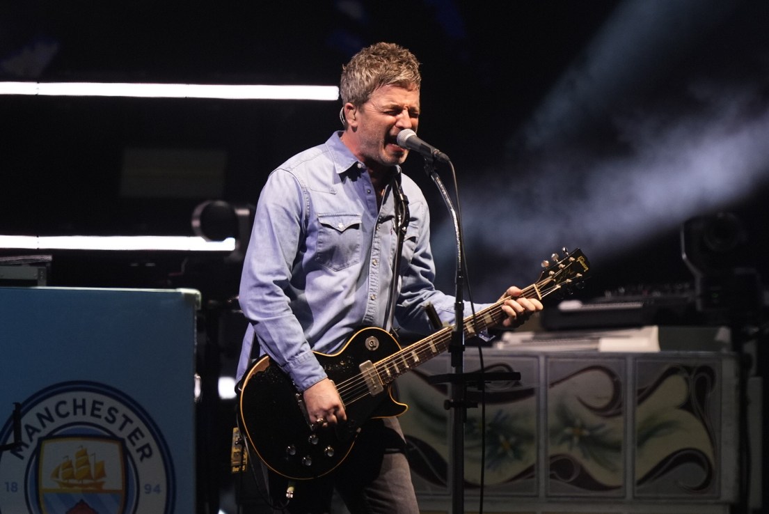Noel Gallagher as Oasis takes to the stage at the Principality Stadium, Cardiff, for the band's long-awaited reunion tour kicks off in Wales. Picture date: Friday July 4, 2025. PA Photo. 