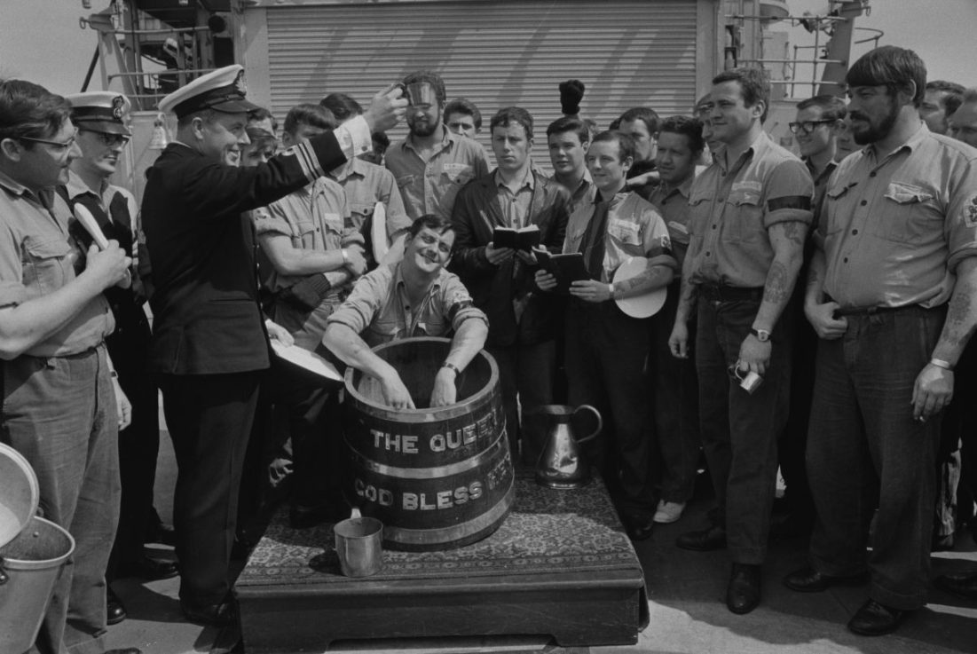 Leander-class frigate at their last rum ration, known in the navy as Black Tot Day, on HMS Ajax, UK, 31st July 1970. (Photo by Evening Standard/Hulton Archive/Getty images)