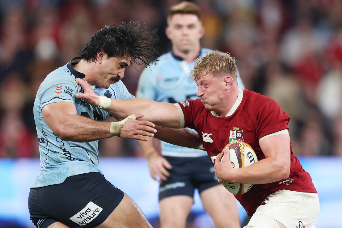 SYDNEY, AUSTRALIA - JULY 05: Jac Morgan of the British and Irish Lions fends off Charlie Gamble of the Waratahs during the tour match between NSW Waratahs and British & Irish Lions at Allianz Stadium on July 05, 2025 in Sydney, Australia. (Photo by Mark Metcalfe/Getty Images)