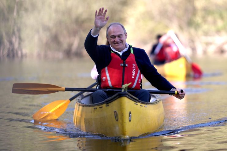 SHREWSBURY, ENGLAND - APRIL 11: Liberal Democrat leader Ed Davey shares a canoe with local MP Helen Morgan while canoeing with councillors on the local election campaign during a visit to Shropshire on April 11, 2025 in Shrewsbury, England. (Photo by Ryan Jenkinson/Getty Images)