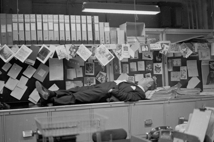 Business man asleep in office