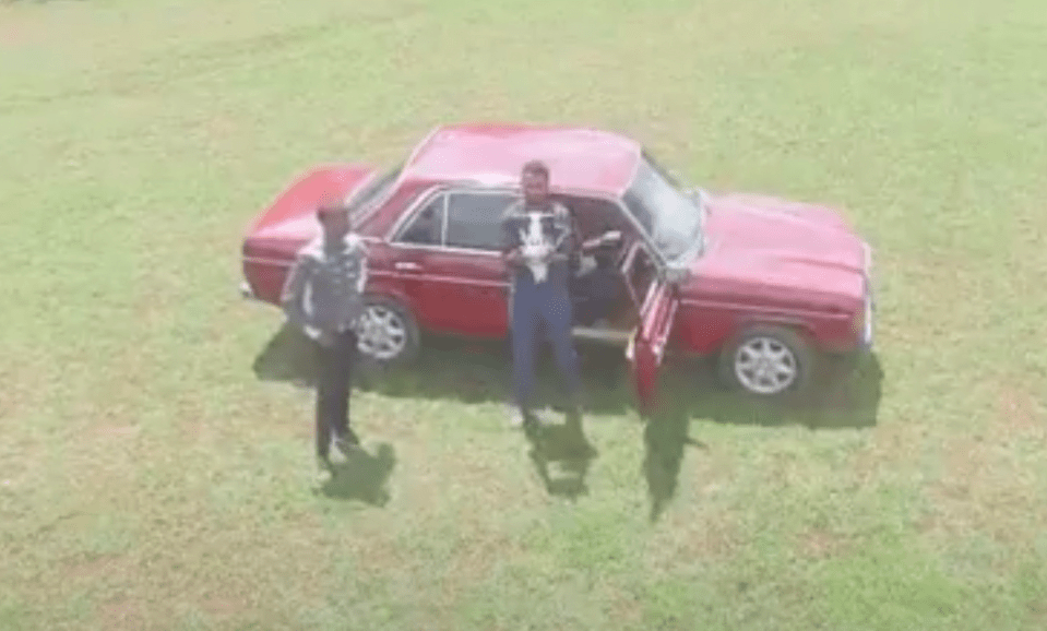 Wilson capturing a picture of himself in his Nairobi village using a drone