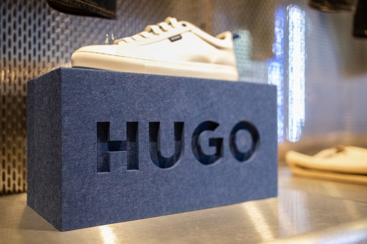 The UK arm of Hugo Boss has reported lower sales and profit for a second year in a row.
