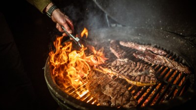 Group enjoying a unique Meat and Maul Butchery BBQ experience at Twickenham Green, part of City Winners prize event
