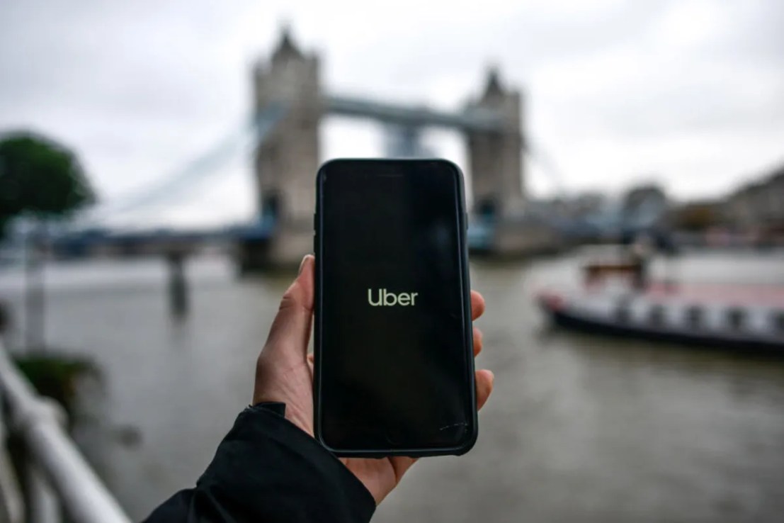 Uber has said it may not be able to maintain its profit in the UK due to rising costs. (Photo by Peter Summers/Getty Images)