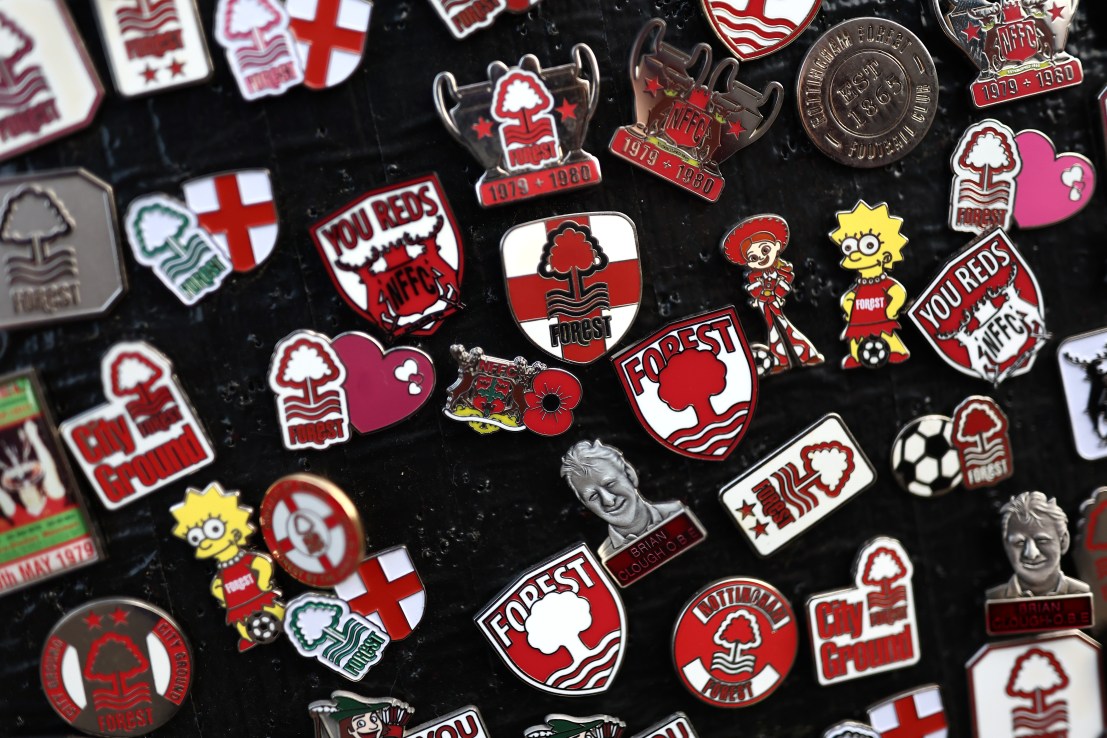 NOTTINGHAM, ENGLAND - NOVEMBER 10: Nottingham Forest pin badges are seen for sale prior to the Premier League match between Nottingham Forest FC and Newcastle United FC at City Ground on November 10, 2024 in Nottingham, England. (Photo by Naomi Baker/Getty Images)