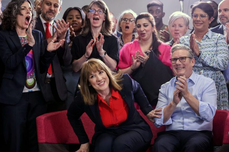 LONDON, ENGLAND - JULY 03: Britain's Chancellor of the Exchequer Rachel Reeves and Britain's Prime Minister Keir Starmer react during a visit to the Sir Ludwig Guttman Health & Wellbeing Centre on July 03, 2025 in London, England. Keir Starmer and Wes Streeting launch the government's 10-Year Health Plan, outlining how the Labour government will deliver the Plan for Change mission to rebuild the NHS through three key reform shifts: analogue to digital, hospital to community, and sickness to prevention. (Photo by Jack Hill - WPA Pool/Getty Images)