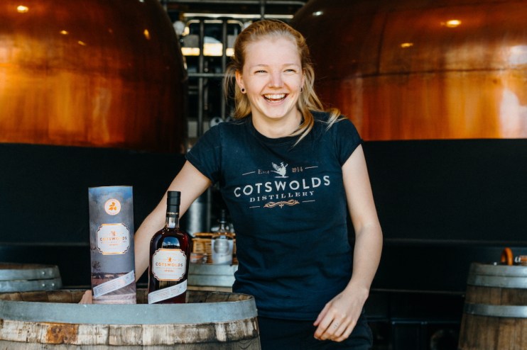 Alice Pearson showcasing Cotswolds Wychwood Harvest Single Malt Whisky at Cotswolds Distillery, limited edition release 2025.