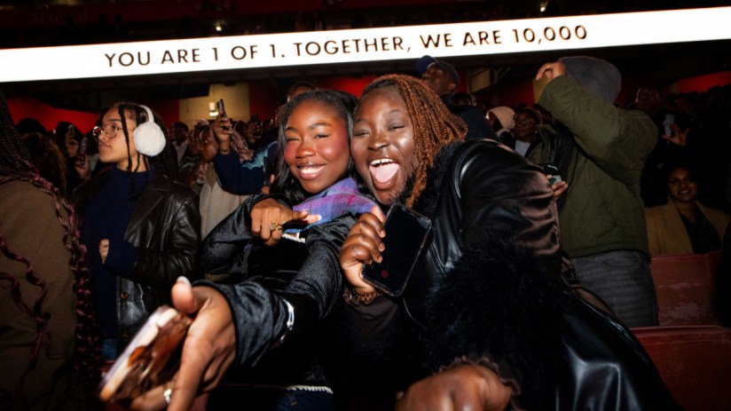 Dan Rouse captures a scenic landscape with vibrant autumn foliage and a serene river, highlighting natural beauty in a bus...