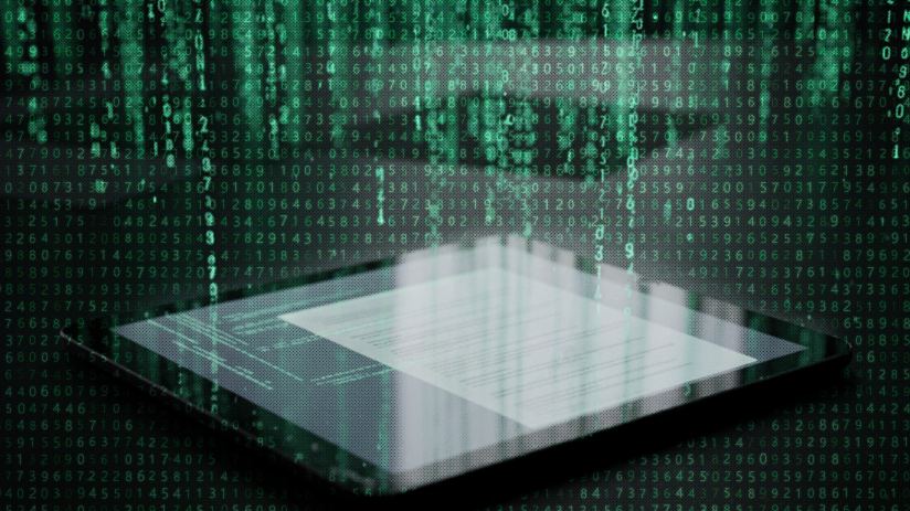 G Research office with modern workstations and employees collaborating on innovative technology solutions