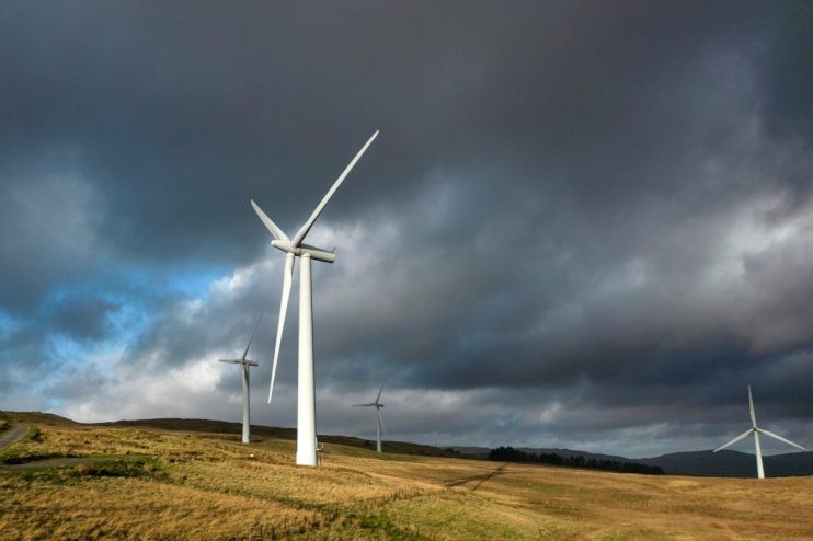 LAMBRIGG, ENGLAND - NOVEMBER 25: In this aerial view, wind turbines adorn the landscape in the Southern Lake District on November 25, 2022 in Lambrigg, England. Two former Conservative prime ministers - Boris Johnson and Liz Truss - have joined the group of MPs calling for England's restrictions on onshore wind farm construction to be overturned. A de fact moratorium was imposed on new wind farms in 2015 by the government of David Cameron, under pressure from Conservative MPs and councils who found them unsightly. Some were allowed to proceed following a rules change in 2020, but planning rules continue to hamper new projects. (Photo by Christopher Furlong/Getty Images)