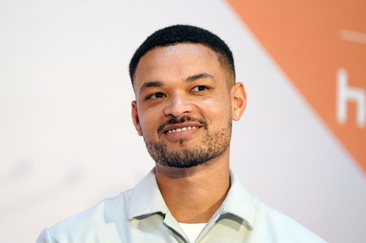 Getty Images logo displayed on a digital screen with vibrant colors and abstract patterns in a professional news setting