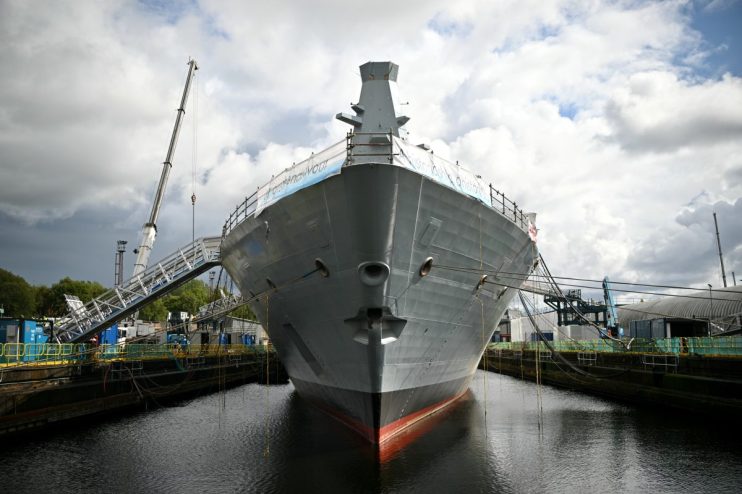 GettyImages 2232996709 showcasing a significant business event with diverse professionals networking at a conference setting
