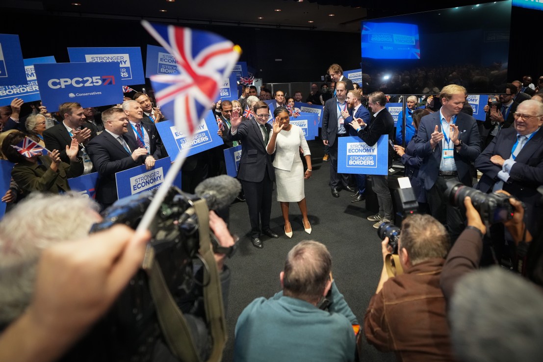MANCHESTER, ENGLAND - OCTOBER 08: Conservative Party leader Kemi Badenoch and her husband Hamish Badenoch acknowledge the audience after she delivers her speech on the final day of the Conservative Party conference at Manchester Central Convention Complex on October 08, 2025 in Manchester, England.Kemi Badenoch goes into her first conference as party leader with current polling putting the Conservative Party in fourth place behind Reform, Labour and the Liberal Democrats.  (Photo by Christopher Furlong/Getty Images)