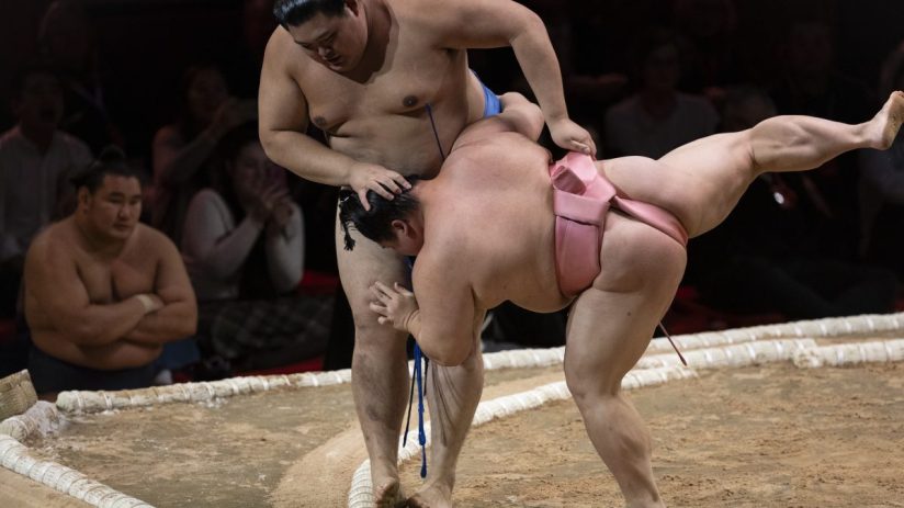 Breaking news conference podium with microphones, journalist cameras in background, symbolizing media coverage and communi...