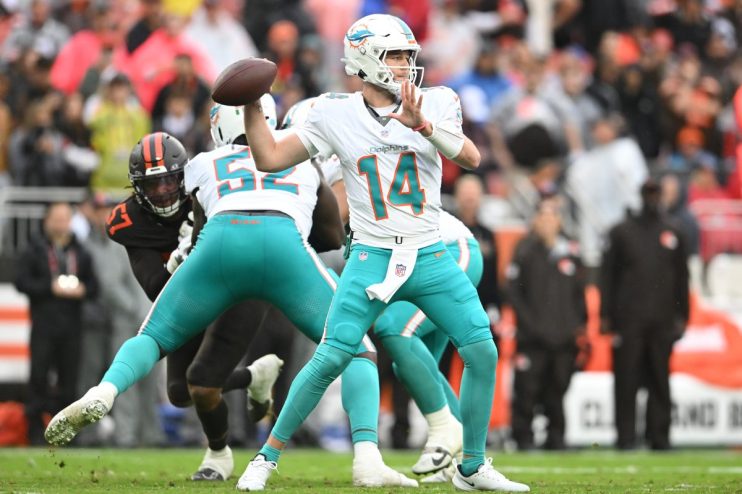 Getty Images logo displayed on a digital screen amidst stock market data, reflecting financial industry insights.