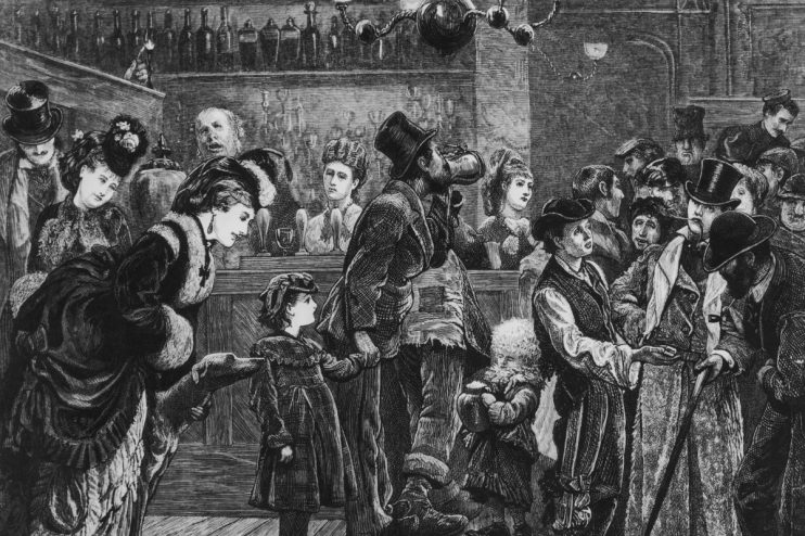 Customers and staff in a London pub, circa 1870. (Photo by Hulton Archive/Getty Images)