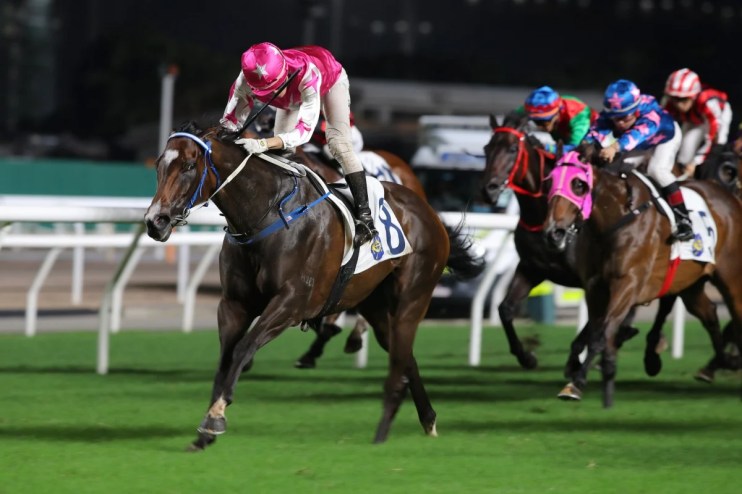 Joy Of Spring galloping at Sha Tin Racecourse under cloudy skies as officials monitor the tropical storm forecast.