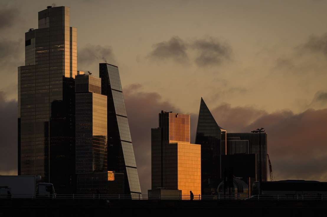 LONDON, ENGLAND - DECEMBER 02: The skyline of the London's financial district is illuminated by the sunrise on December 02, 2024 in London, England. The Confederation Of British Business (CBI) has released a survey that says expectations of growth among British businesses are negative for the first time this year, since Rachel Reeves's budget. October's budget, the first of the new Labour government, saw a rise in employers' National Insurance contributions, while private sector activity declined in the three months to November.  (Photo by Leon Neal/Getty Images)
