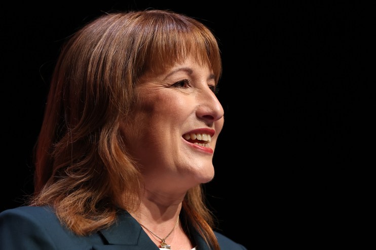 Rachel Reeves delivering a speech at a business conference, highlighting economic strategies and fiscal policies.