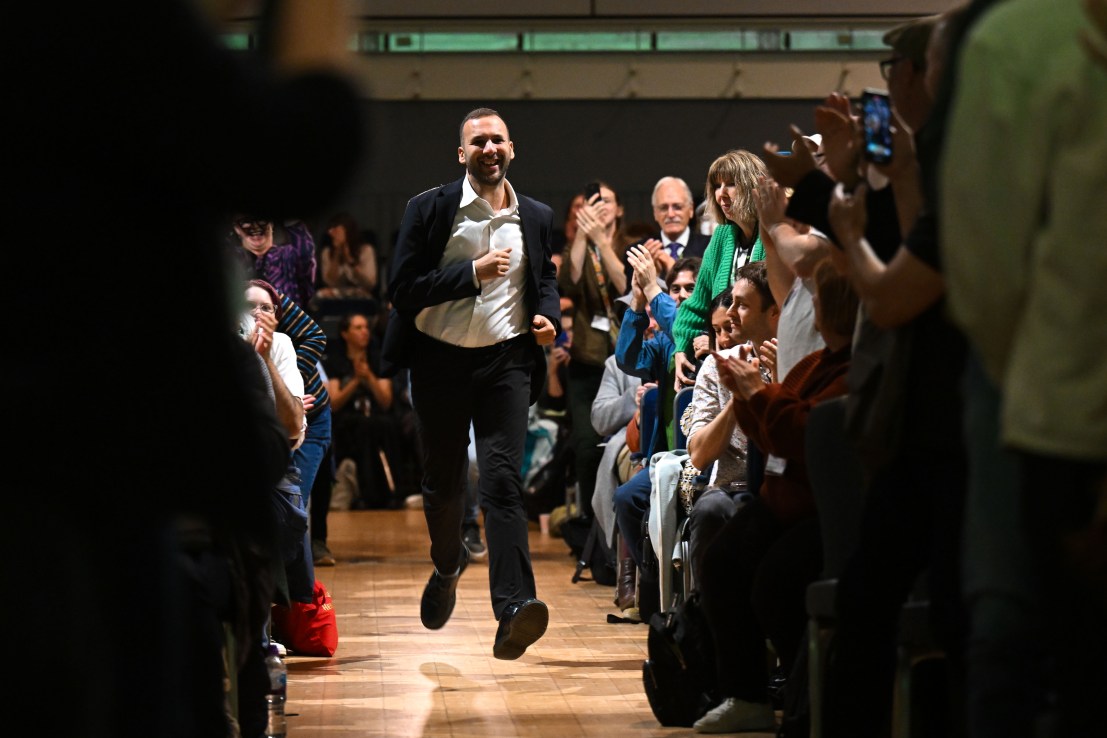 BOURNEMOUTH, ENGLAND - OCTOBER 03: Green Party leader Zack Polanski runs into the hall to deliver his speech on the first day of the Green Party Conference at Bournemouth International Centre on October 03, 2025 in Bournemouth, England. The Green Party go into this year's conference with new leader Zack Polanski and will focus on the cost-of-living, climate crises and the NHS. (Photo by Finnbarr Webster/Getty Images)